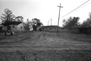 Houses and telephone poles: Telephone poles and power lines were often good indicators of where the streets had been located. It was not uncommon to walk down a muddy avenue only to be stopped by a house moved from its foundation. 