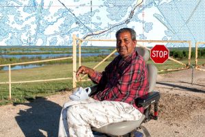 Where the Isle de Jean Charles Road meets the Morganza to the Gulf levee, Sidney Gary Verdin, Pointe aux Chenes, Louisiana