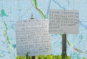 Island is not for Sale, Yardsign written by Edison Dardar Jr. resident of Isle de Jean Charles, Louisiana